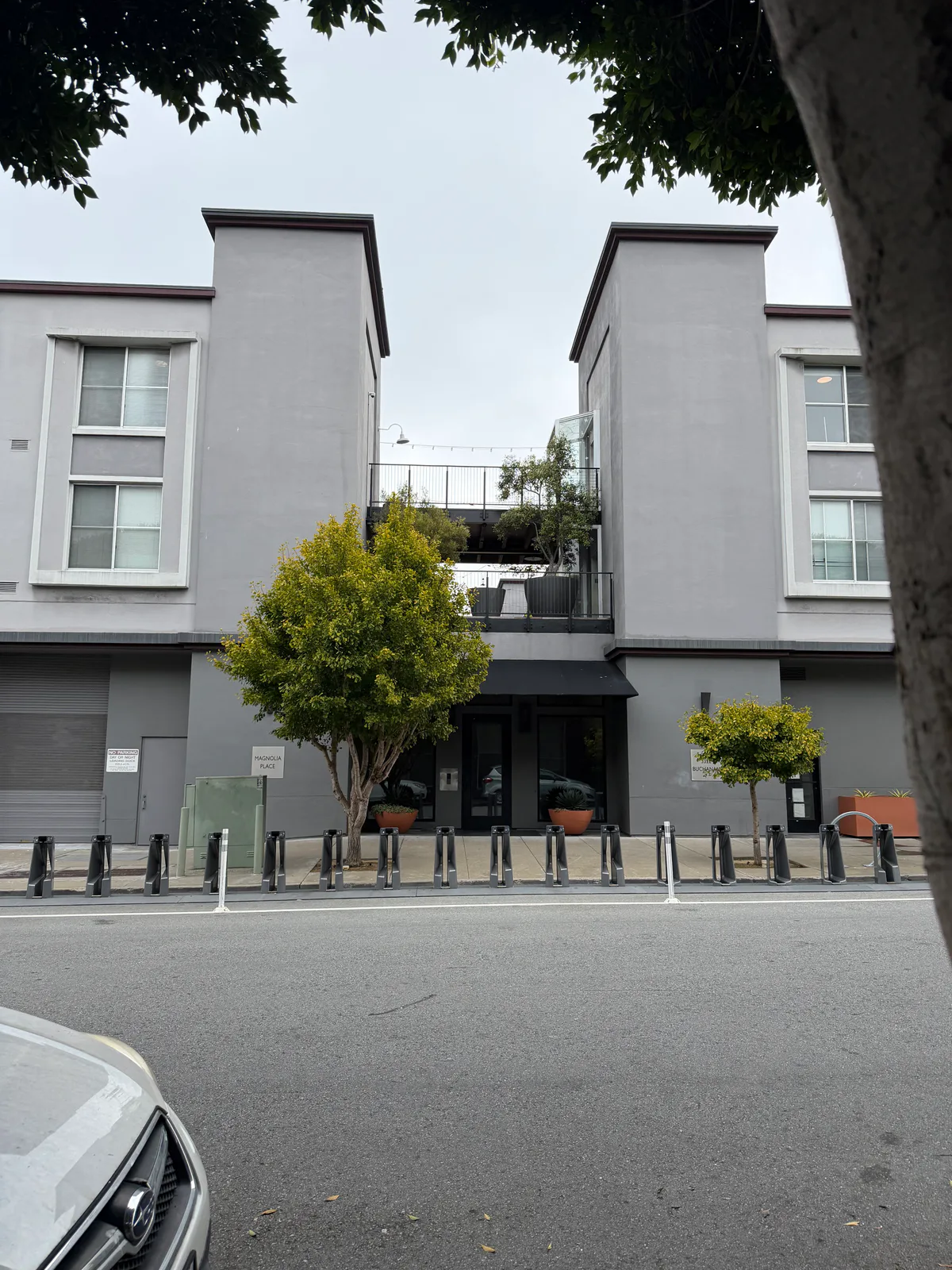 Street-facing exterior and entrance of Magnolia Place at 3322 Buchanan Street